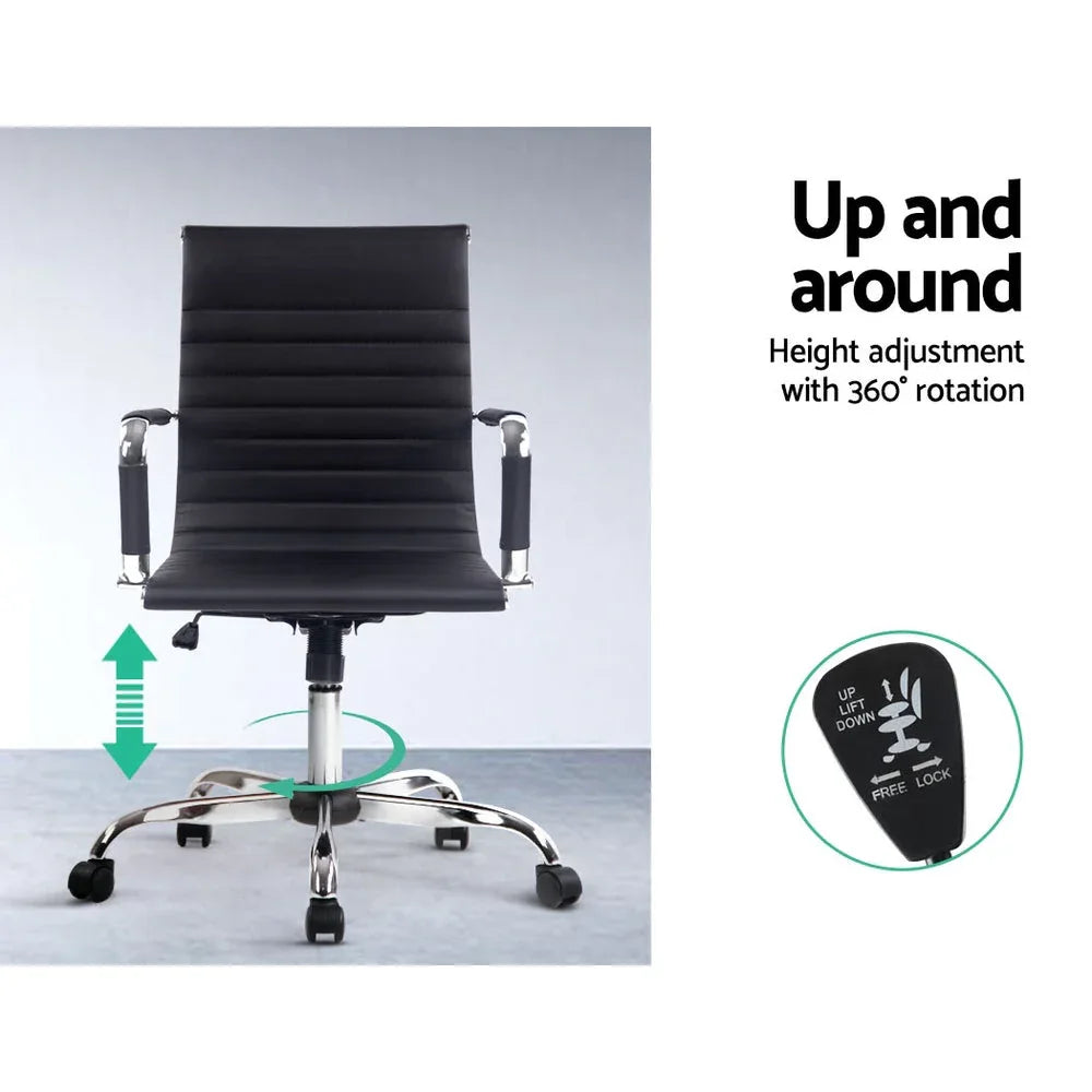 Black ergonomic office chair placed in a modern home office setting.
