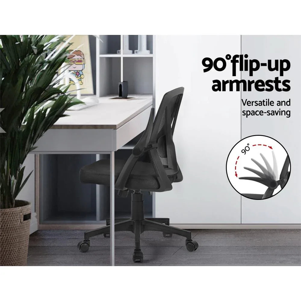 Black office chair with swivel seat and breathable mesh backrest captured against white background.