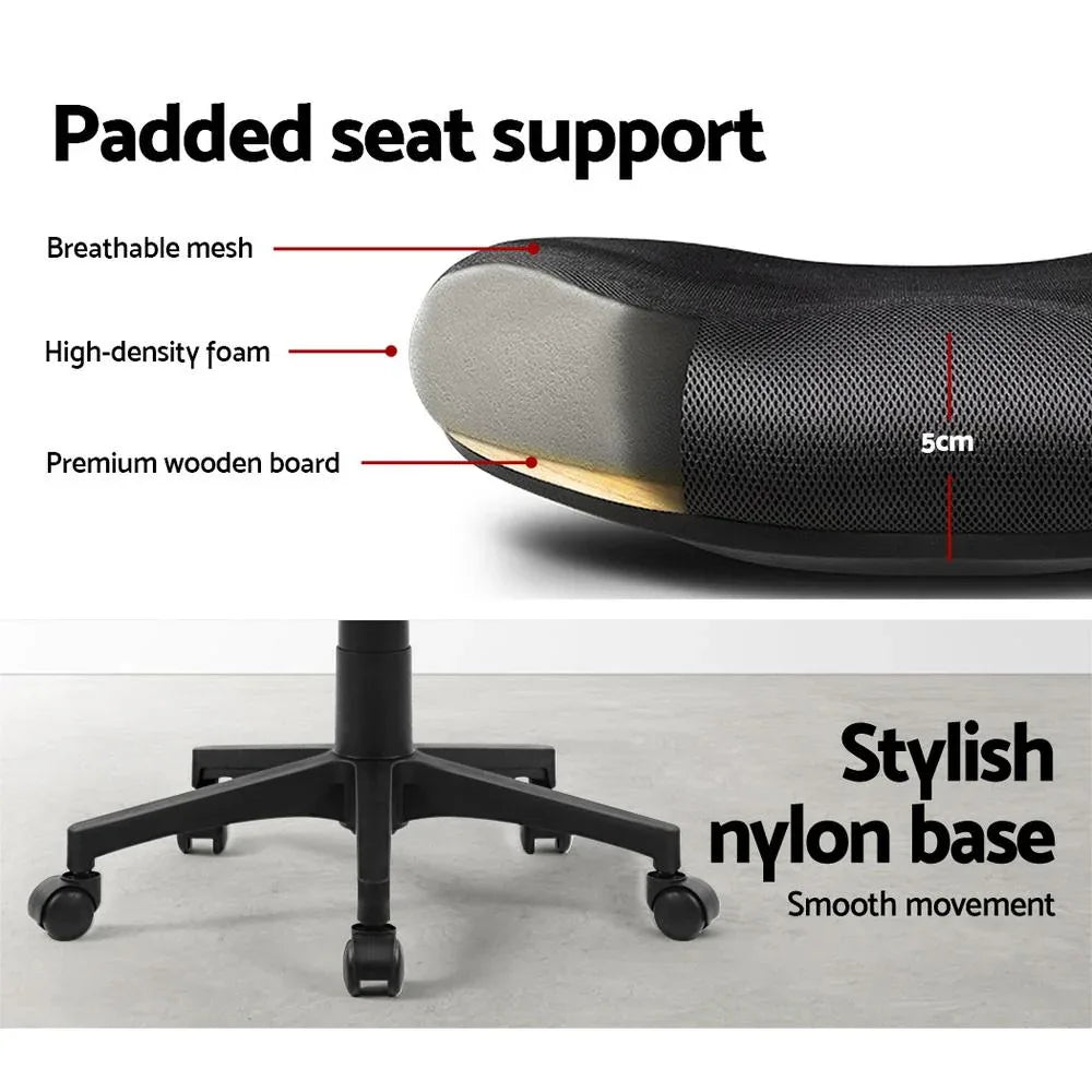 Tilted view of mid-back mesh office chair highlighting adjustable lumbar support and cushion.