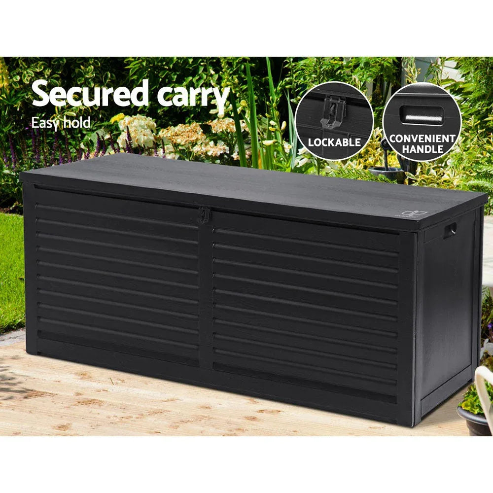 Outdoor storage chest with weather-resistant black finish, positioned on wooden deck.