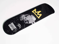 Posty Skateboard standing upright with detailed graphics visible on the deck.