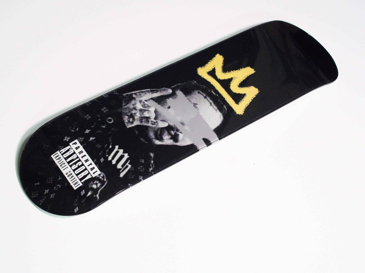 Posty Skateboard standing upright with detailed graphics visible on the deck.