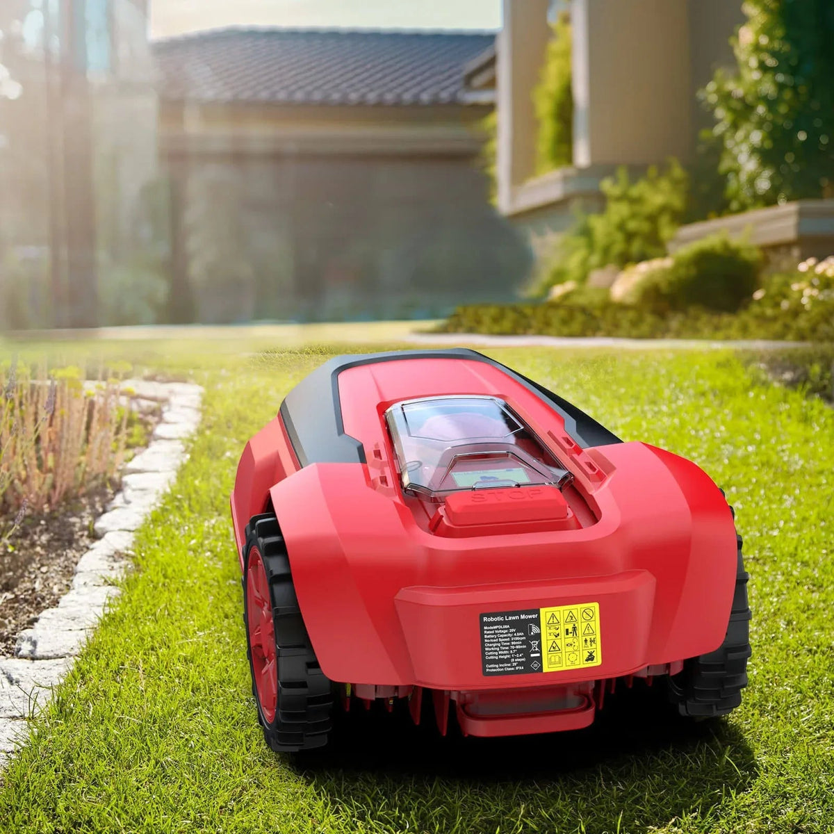 Close-up of mower's control panel and wheels on a green lawn