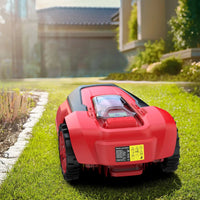 Close-up of mower's control panel and wheels on a green lawn