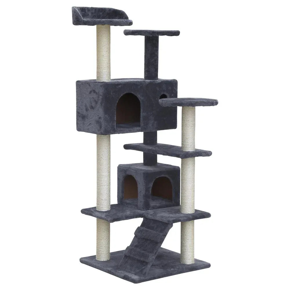 Tall gray cat tree with multiple platforms and sisal scratching posts in a living room setting.