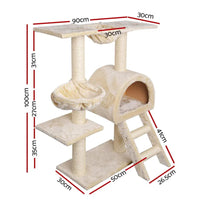 Cat tree with several platforms and hanging toys, offering spaces for climbing and scratching.