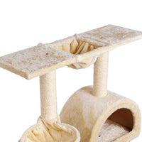 Side perspective of the cat tree highlighting padded platforms and hanging rope toy.