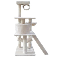 Upper platform of cat tree with soft textured surface and hanging mouse toy.
