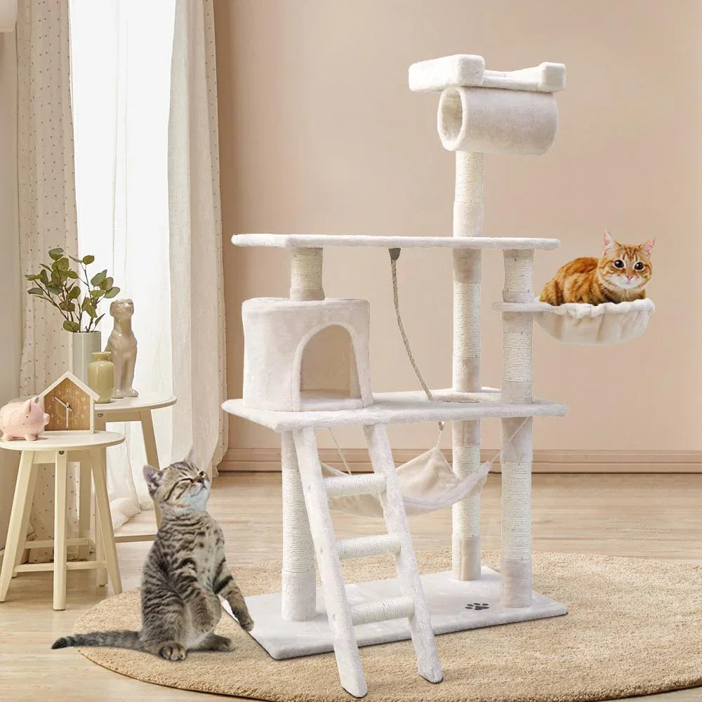 Full view of tall beige cat tree with multiple levels, hiding areas, and vertical posts.