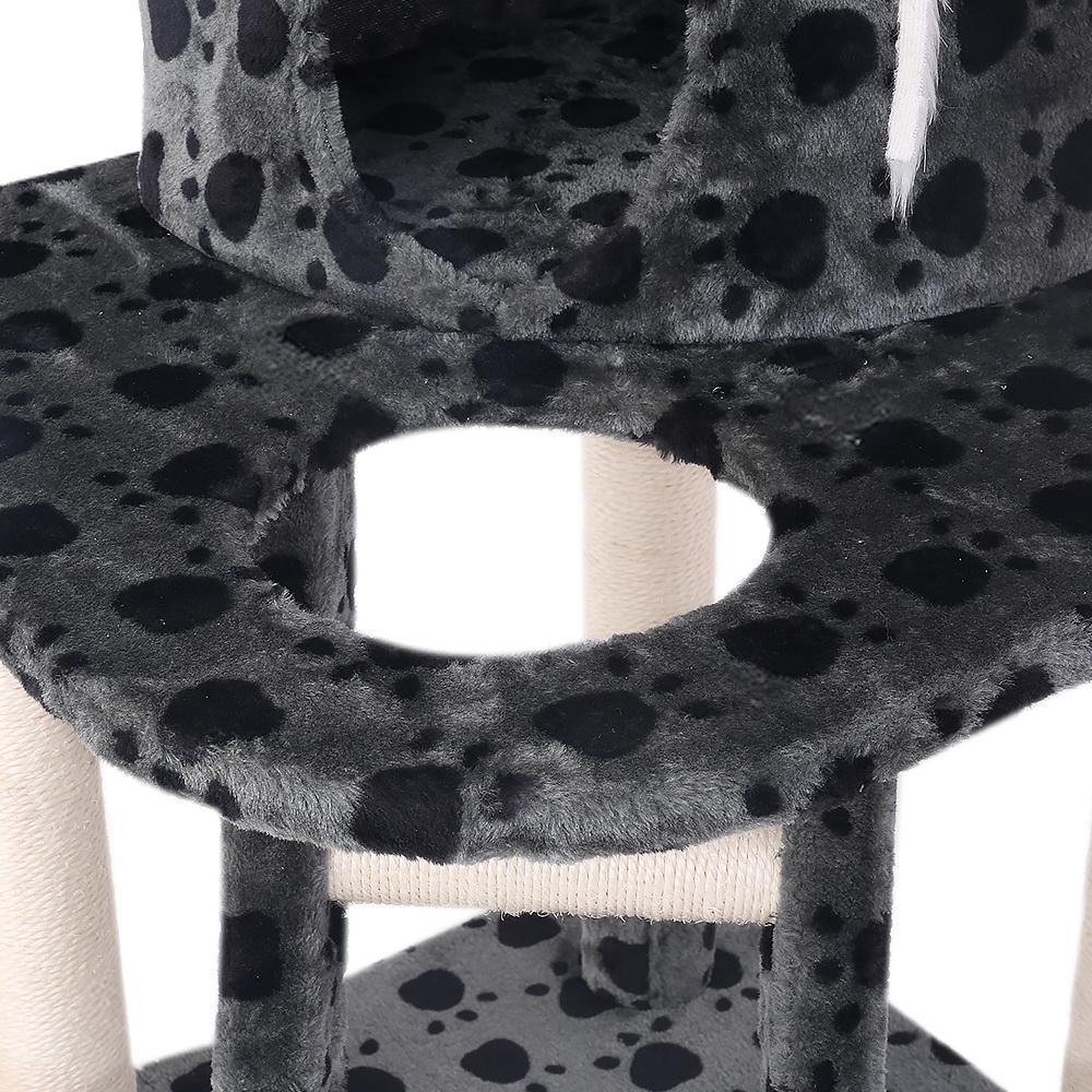 Close-up on thick sisal-wrapped post of beige cat tree for cats to scratch and climb on.