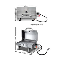 Portable gas grill shown folded with retractable steel legs for easy transport and storage.