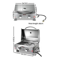 Open portable gas BBQ showing two stainless steel burners and cooking grates.