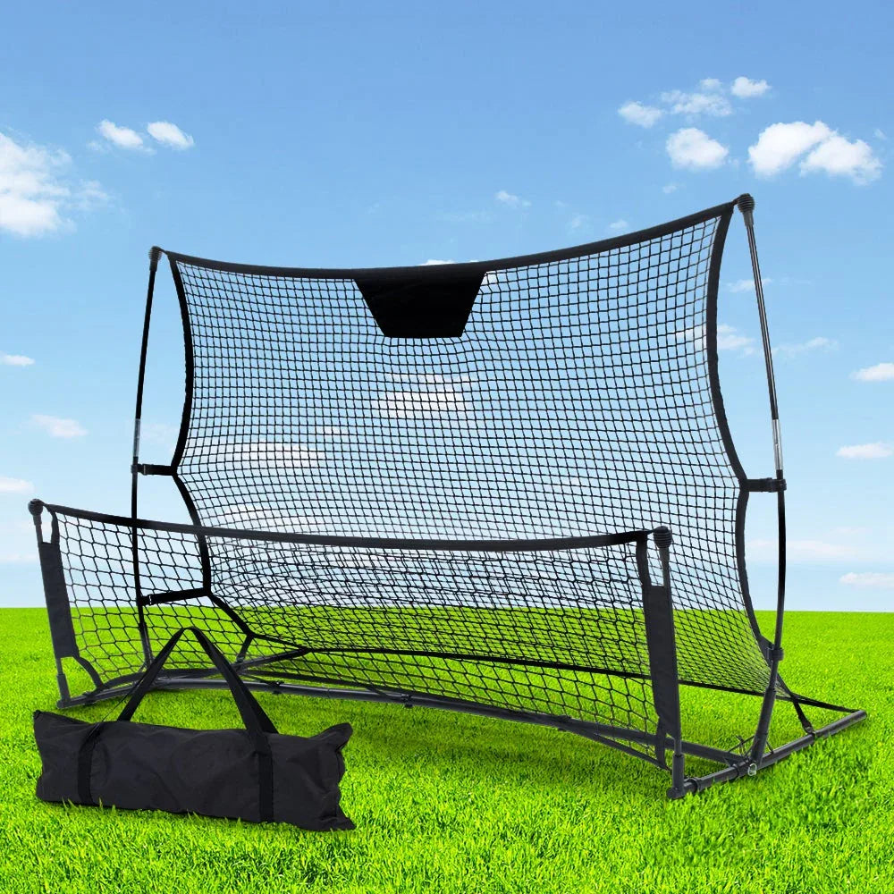 Full view of soccer rebounder net positioned on field with ball approaching for reactive volley training.