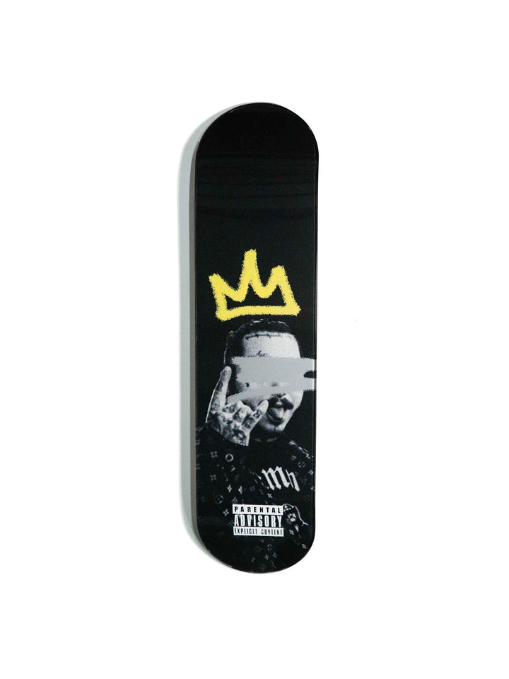Close-up of Posty Skateboard deck with colorful graffiti design.