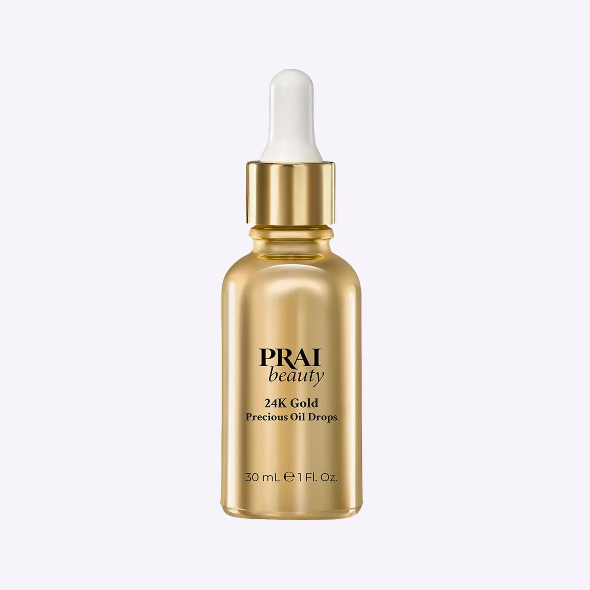 Bottle of PRAI Beauty 24K Gold Precious Oil Drops with golden oil and botanical ingredients