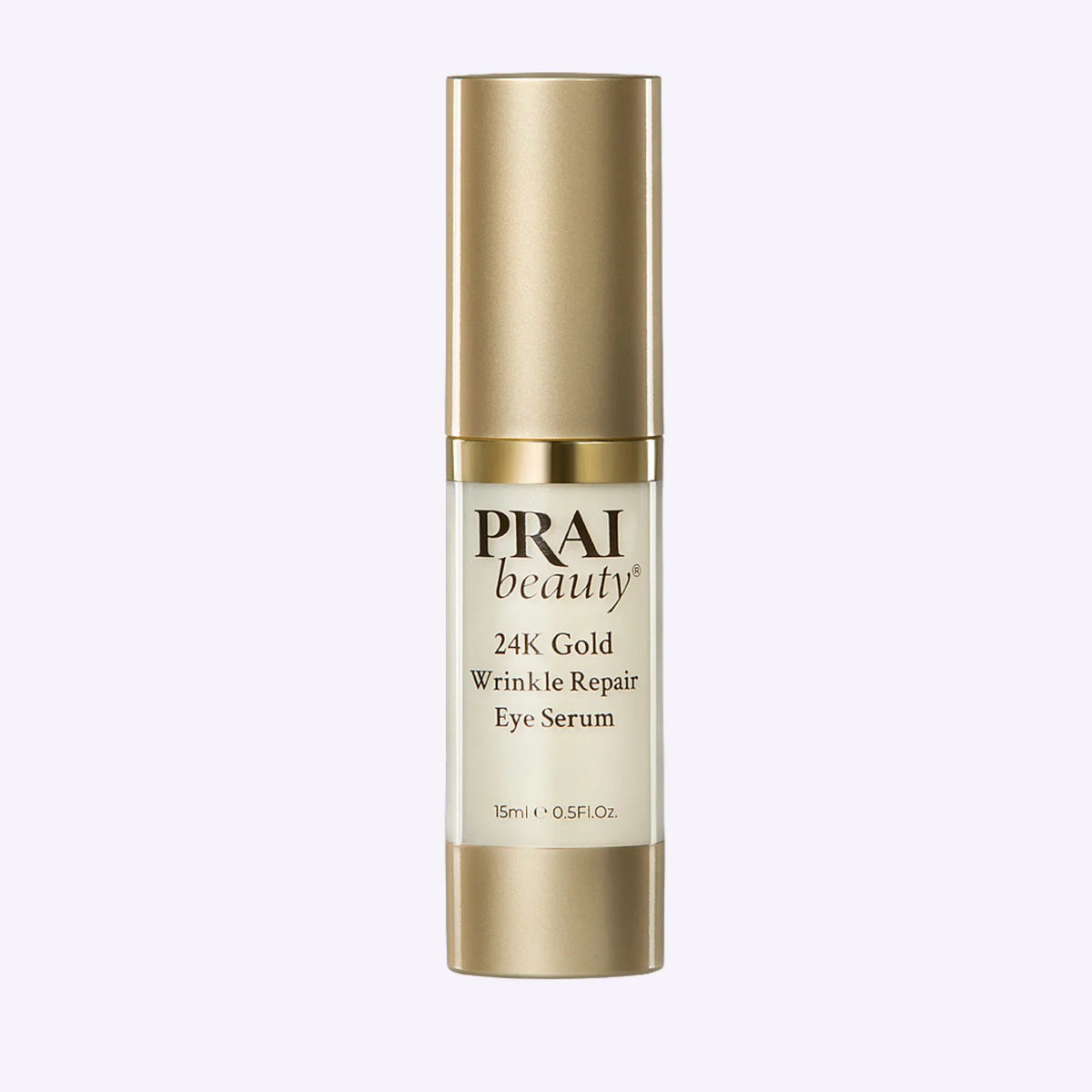 Bottle of PRAI Beauty 24K Gold Wrinkle Repair Eye Serum with gold accents and clear glass container