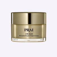 Jar of PRAI Beauty 24K Gold Wrinkle Repair Night Creme with whipped texture and gold accents on label