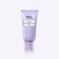 PRAI Beauty Ageless Throat & Decolletage Serum 60ml bottle with rollerball applicator on white background.