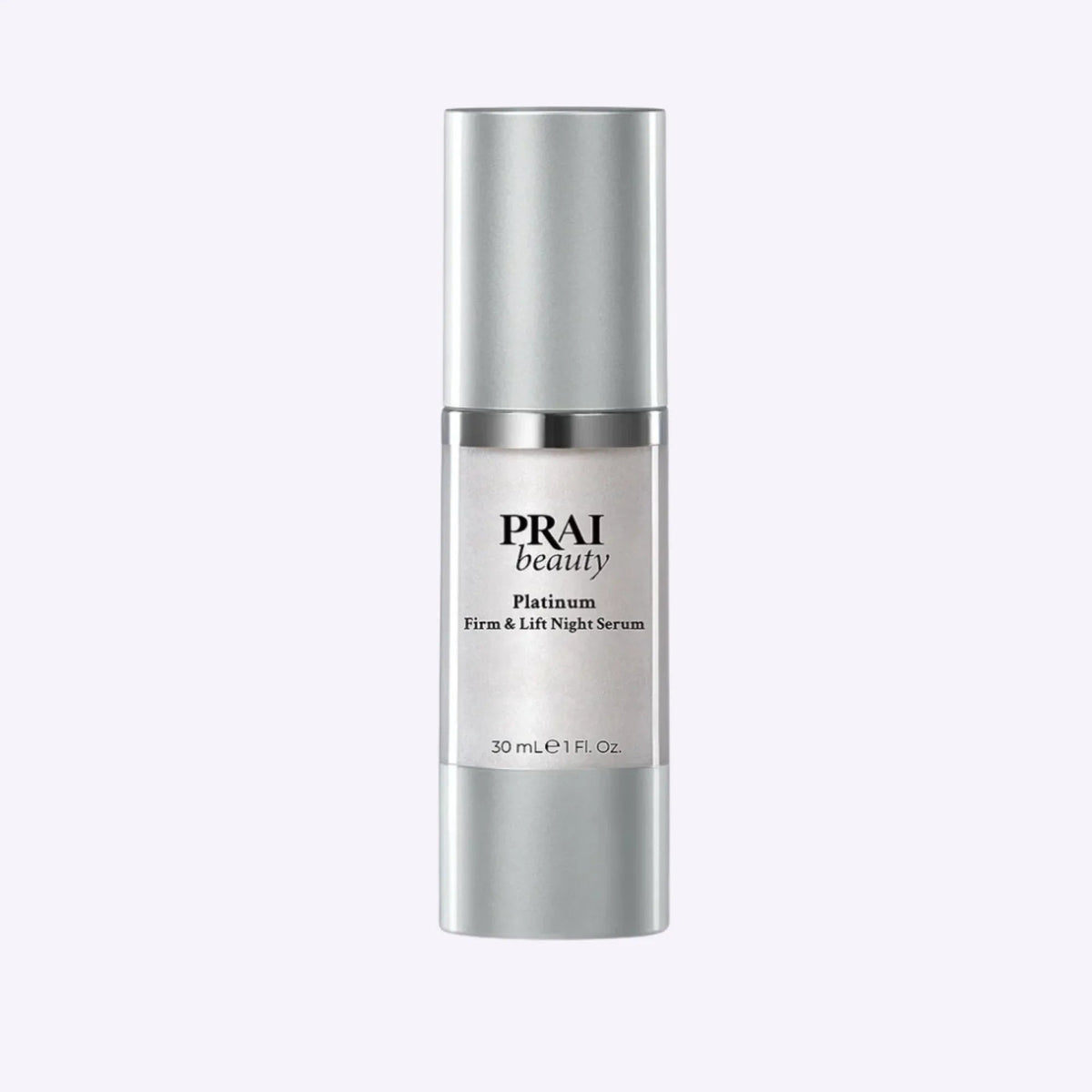 Bottle of PRAI Beauty Platinum Night Caviar Firm & Lift Serum with elegant white and silver packaging