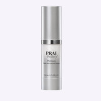 Smaller 15ml bottle of PRAI Beauty Platinum Rare Advanced Serum with sleek silver and white packaging.