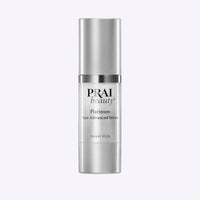 Bottle of PRAI Beauty Platinum Rare Advanced Serum in 30ml size with silver and white design.