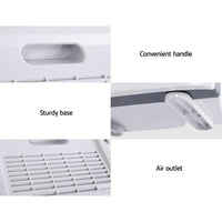 Compact white air purifier with carbon filter and ioniser features displayed.