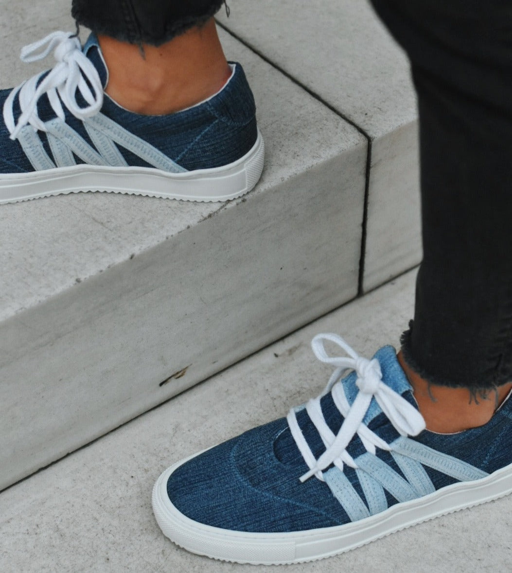 Snagva Blue Phoenix Sneaker – lifestyle shot worn outdoors