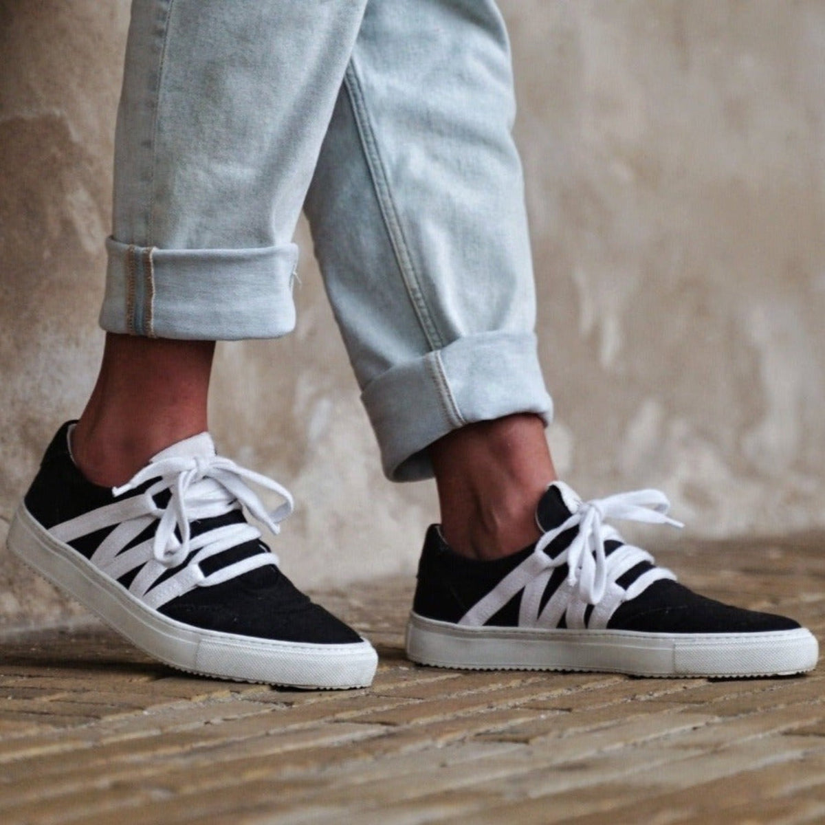 Black Phoenix Sneaker - close-up of black and white contrast design