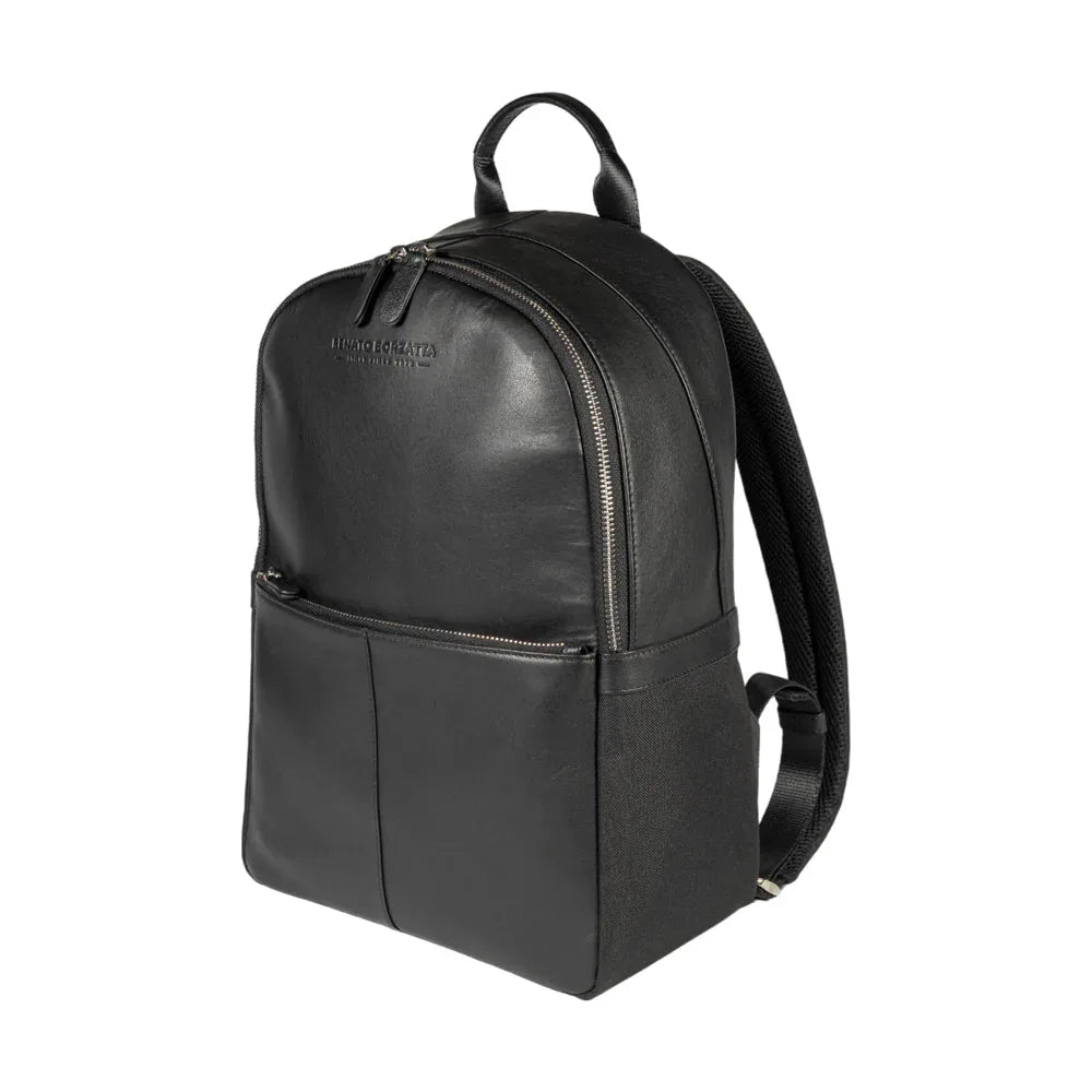 Front view of black nylon and genuine leather backpack with silver zippers