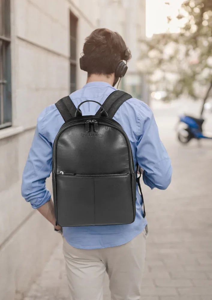 Organizational pockets inside backpack for documents, pens, and business cards
