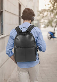 Organizational pockets inside backpack for documents, pens, and business cards