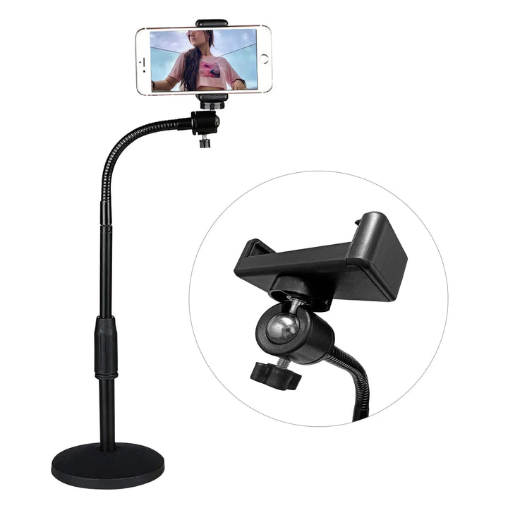 Adjustable scissor boom arm phone stand clamped on desk holding a smartphone at angled view.