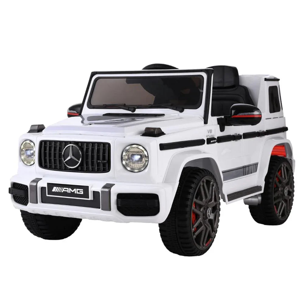 White Mercedes-Benz AMG G63 kids electric ride-on car front view with detailed grill and headlights