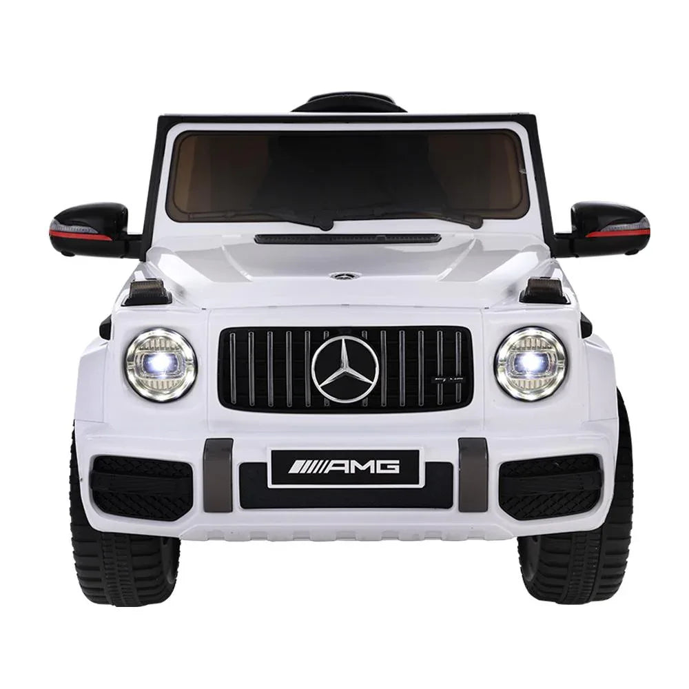 Interior cockpit view of kids ride-on AMG G63 with steering wheel and dashboard details