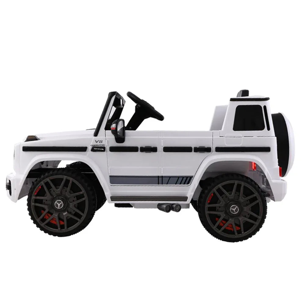 Rear view of white Mercedes-Benz AMG G63 kids electric car showing tail lights and bumper