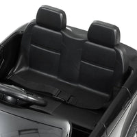 Top view of black Land Rover Evoque kids electric car showing seat and control panel.