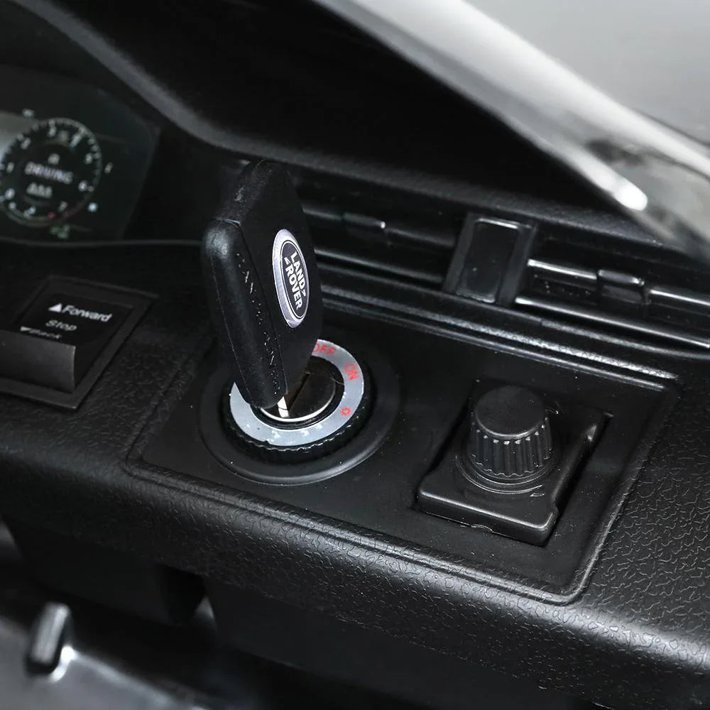 Interior view of kids ride on car highlighting the steering wheel and dashboard controls.