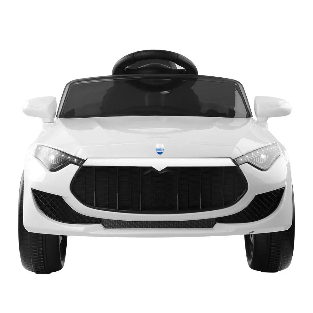Side view of white Rigo kids' ride on car highlighting wheels and body design.