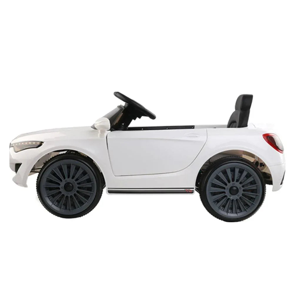 Front view of white Maserati-inspired electric ride on car for children.