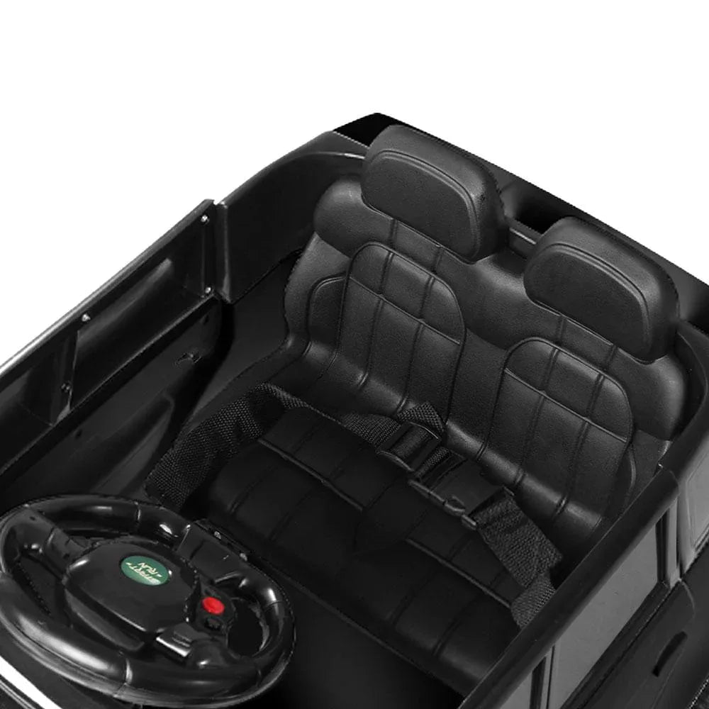 Rear view of black kids electric ride-on car showing taillights and solid frame.