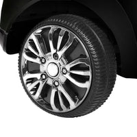 Kids electric ride-on car in black with visible pedals and rugged wheels for outdoor fun.