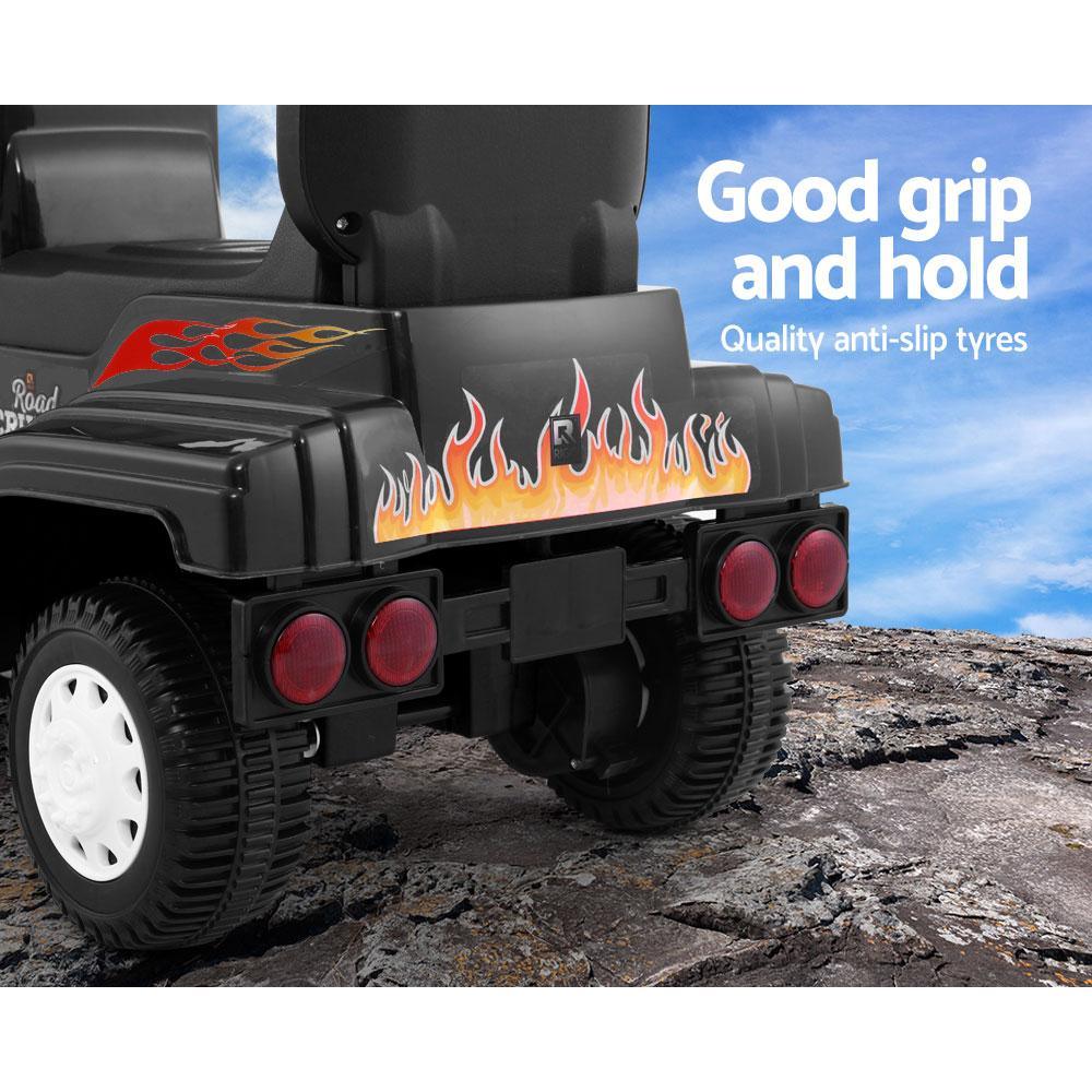 Top-down view of black kids' ride-on electric truck highlighting seat and steering wheel.
