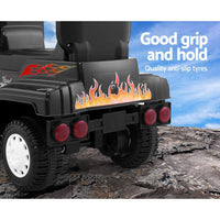 Top-down view of black kids' ride-on electric truck highlighting seat and steering wheel.
