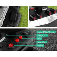 Black electric ride-on truck for children angled to show tire treads and side details.