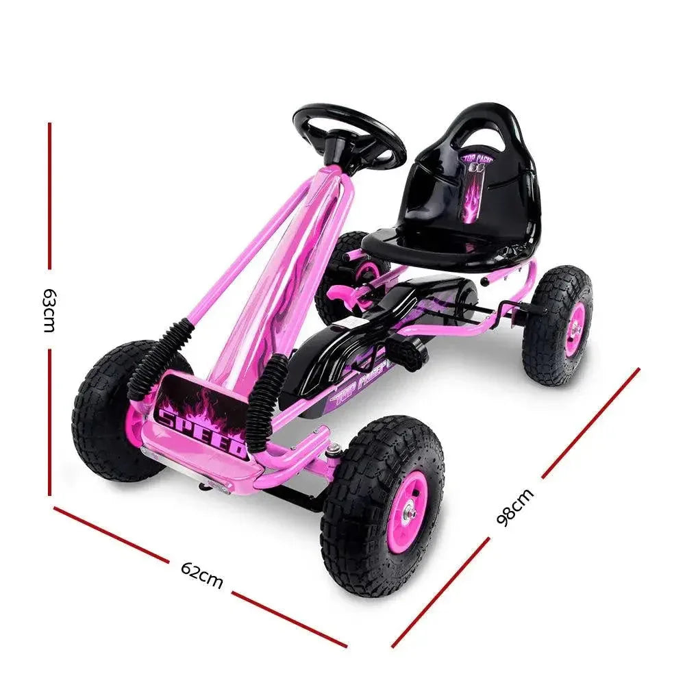 Side view of red pedal go kart showing durable frame and large rubber wheels.