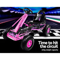 Kids pedal go kart angled to show full rubber tyres and solid frame design.