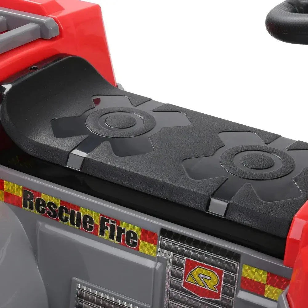 Top-down view of red and grey kids ride-on fire truck motorcycle showing seat and controls.