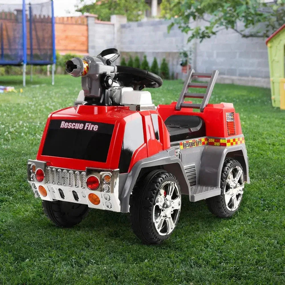 Close view of kids red and grey ride-on fire truck motorbike with visible wheels and footrests.