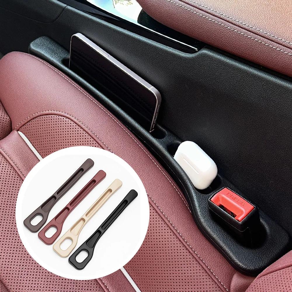 Black car seat gap filler strip placed between seat and center console.