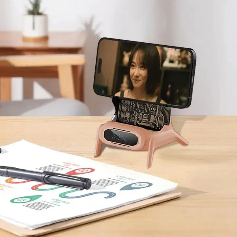 Wireless charger shaped like a chair with phone screen showing active use.